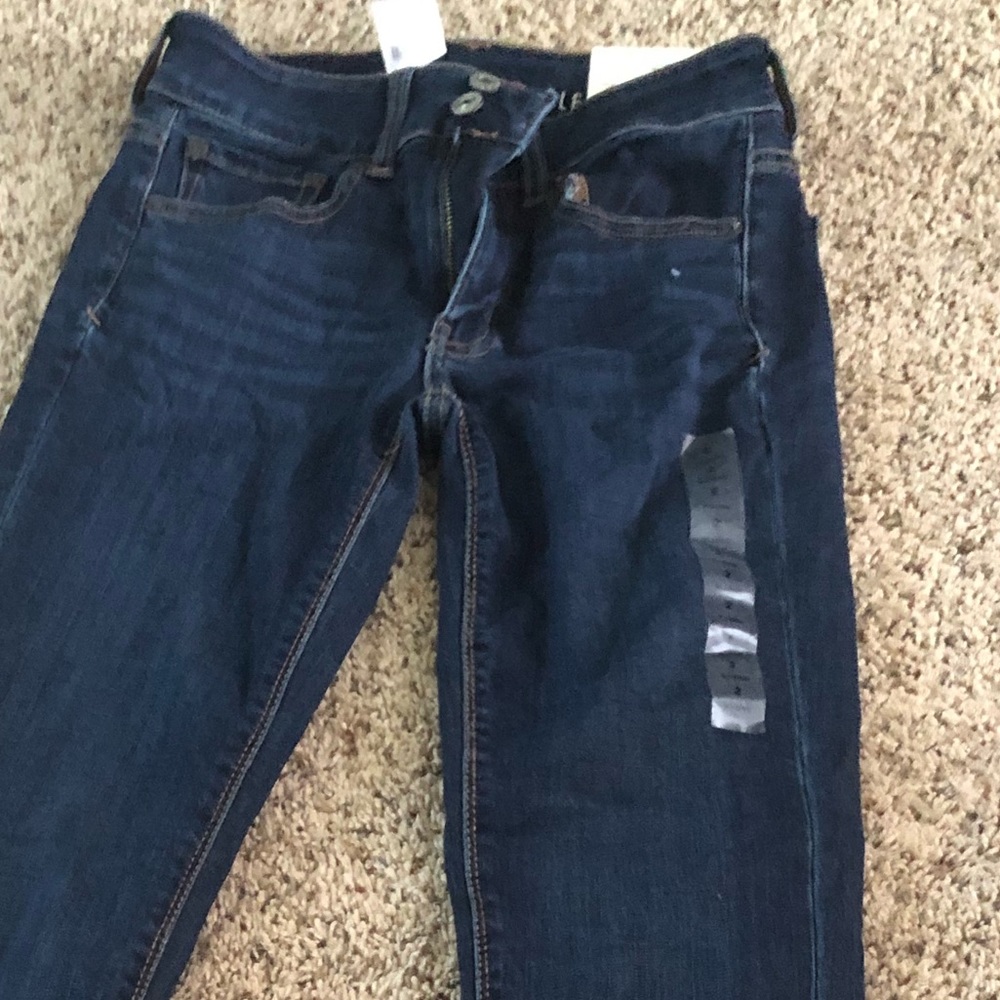 AE high rise artist flare jeans